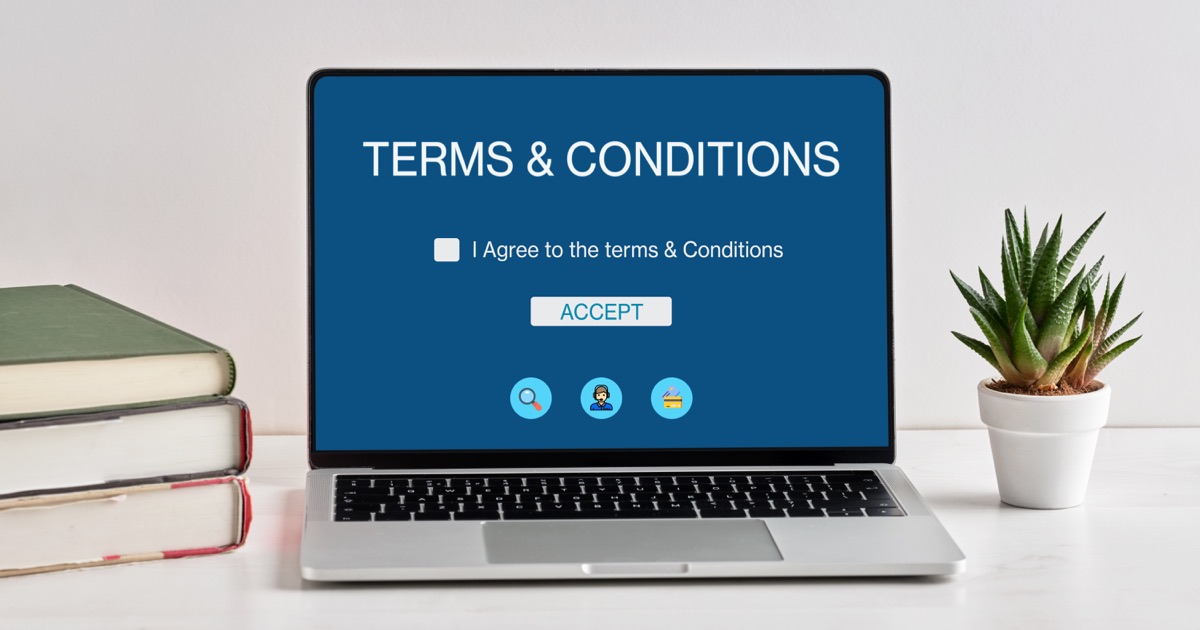 Laptop displaying terms and conditions for website consent management