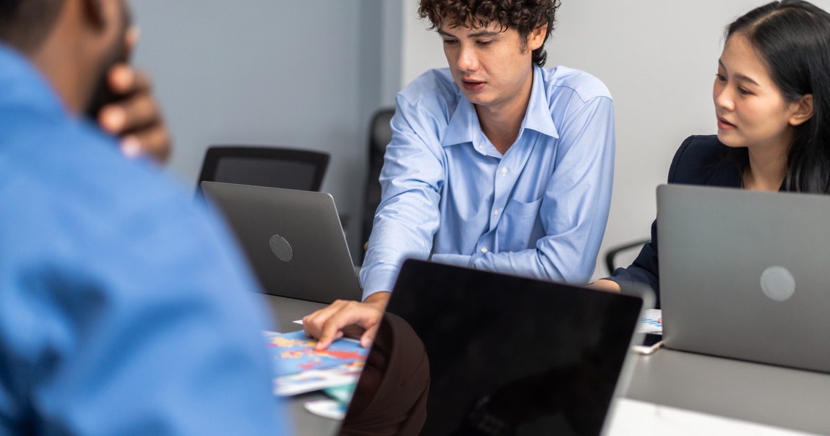 IT consulting team planning an ERP system integration in an office