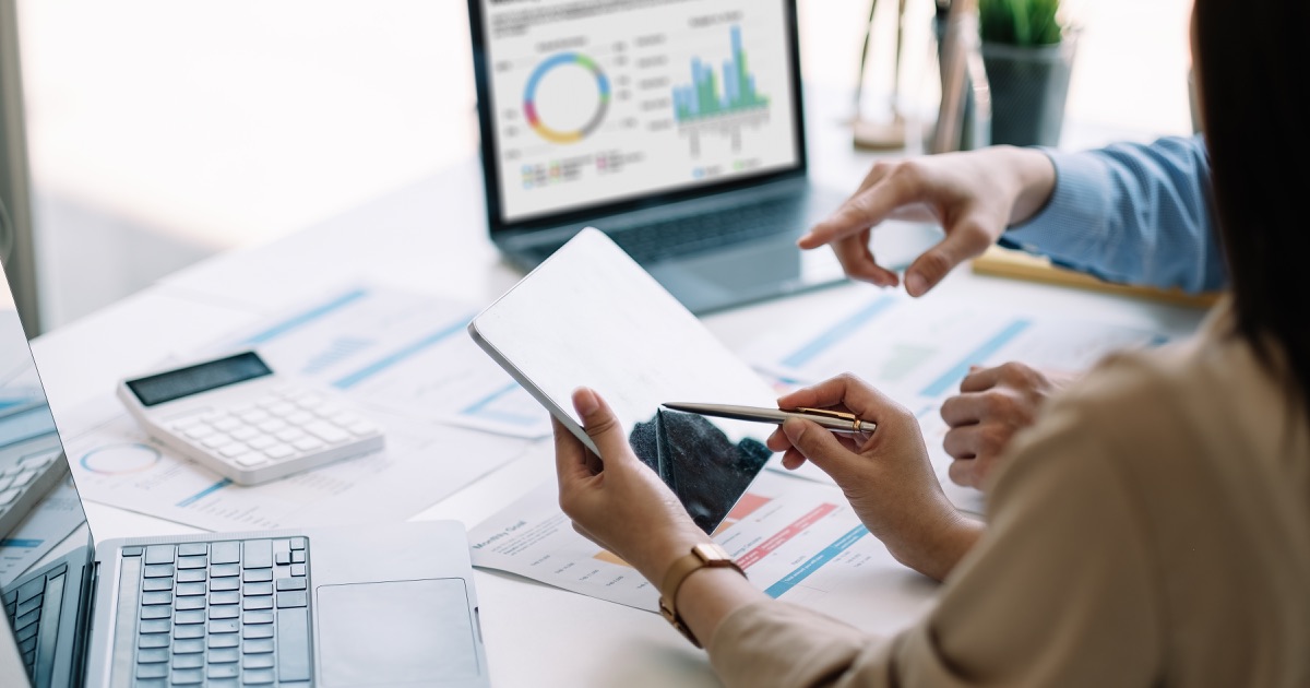 Business team reviewing analytics dashboards and performance reports
