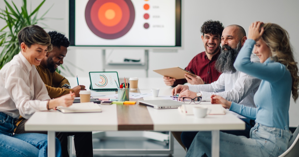 Marketing team reviewing growth data and organic SEO performance
