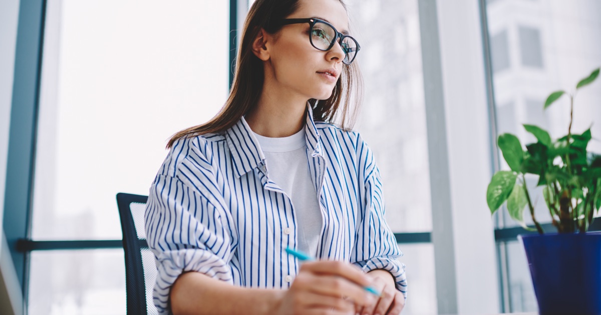 Content strategist planning an SEO content brief at a desk