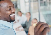 The Main Types of SEO (And Which Ones Actually Matter For Your Website) Digital marketing professional planning an SEO strategy with an office team