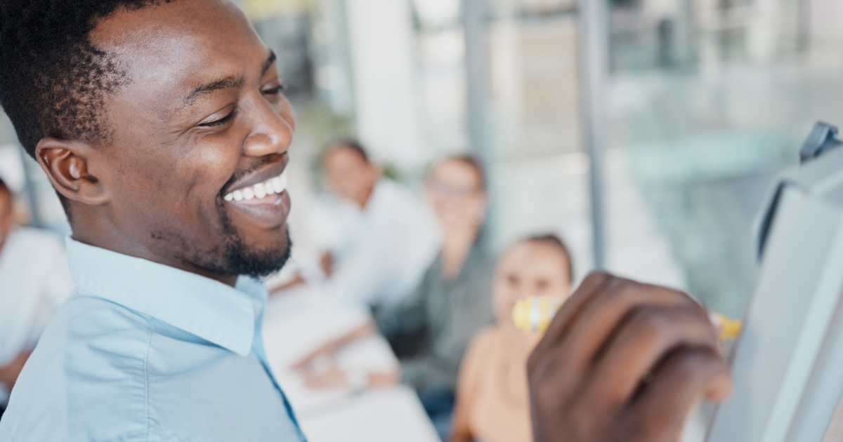 Digital marketing professional planning an SEO strategy with an office team