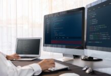 WordPress Maintenance for Business-Critical Sites, Updates, Plugins, and Risk Management Software engineer maintaining website code on multiple computer screens